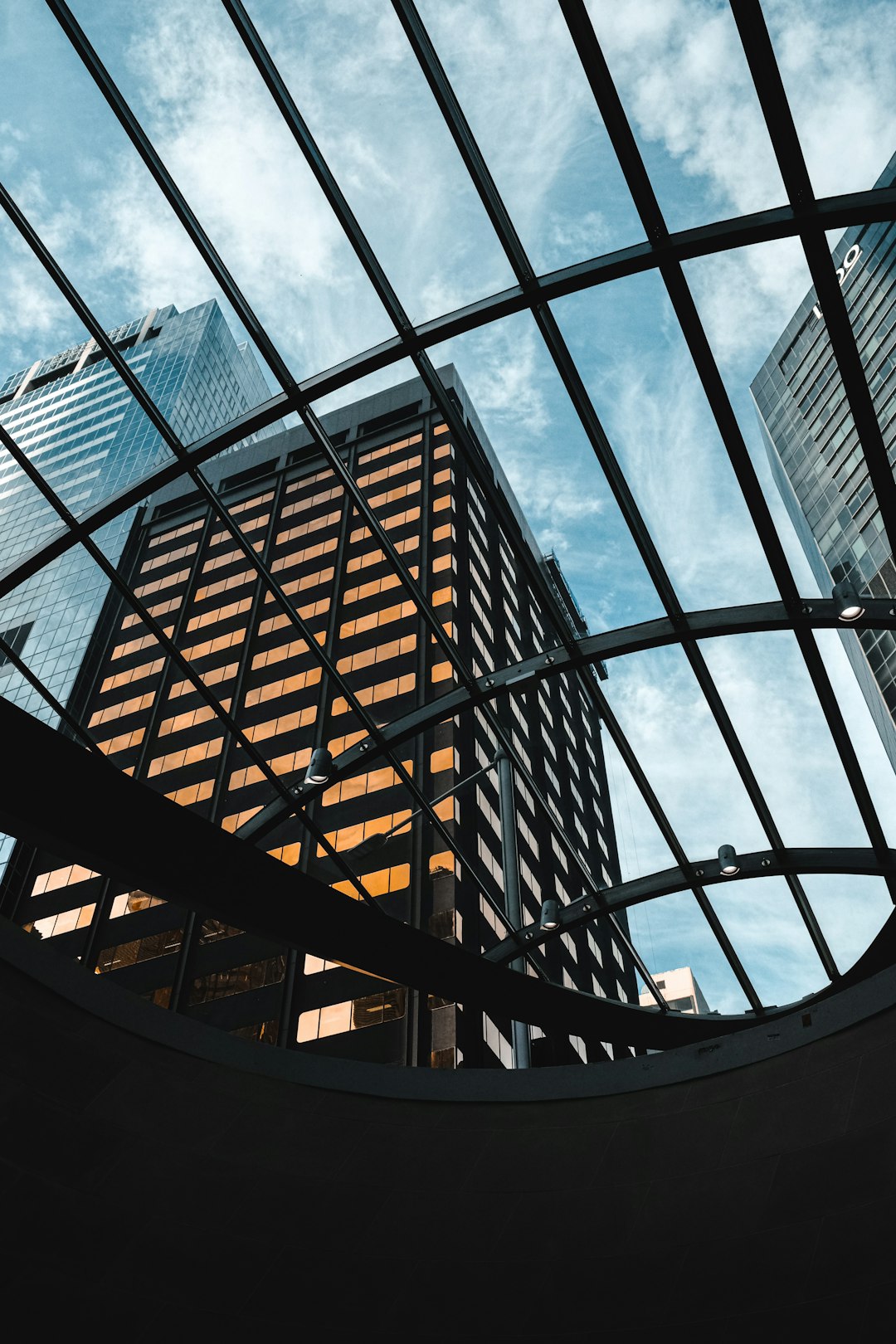 brown-metal-framed-glass-building-lvolg2nepos